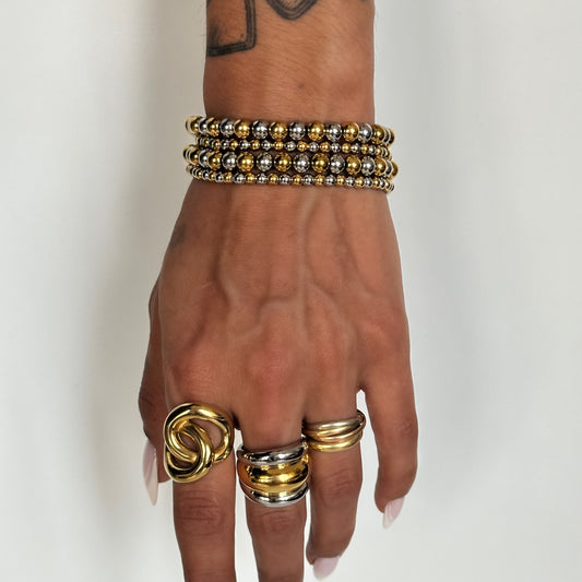 lot de 2 bracelets Abby élastiques acier inoxydable plaqué or 18k billes bicolores portés