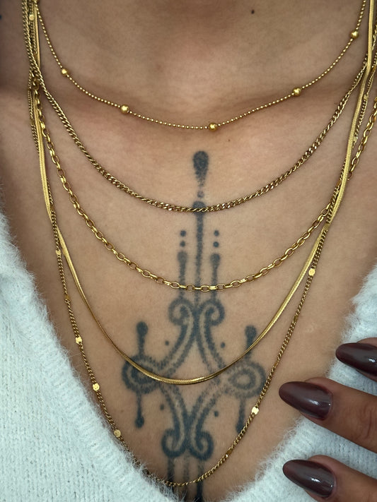 Collier Soline doré en acier inoxydable, composé de plusieurs chaînes fines superposées de 35 à 60 cm porté