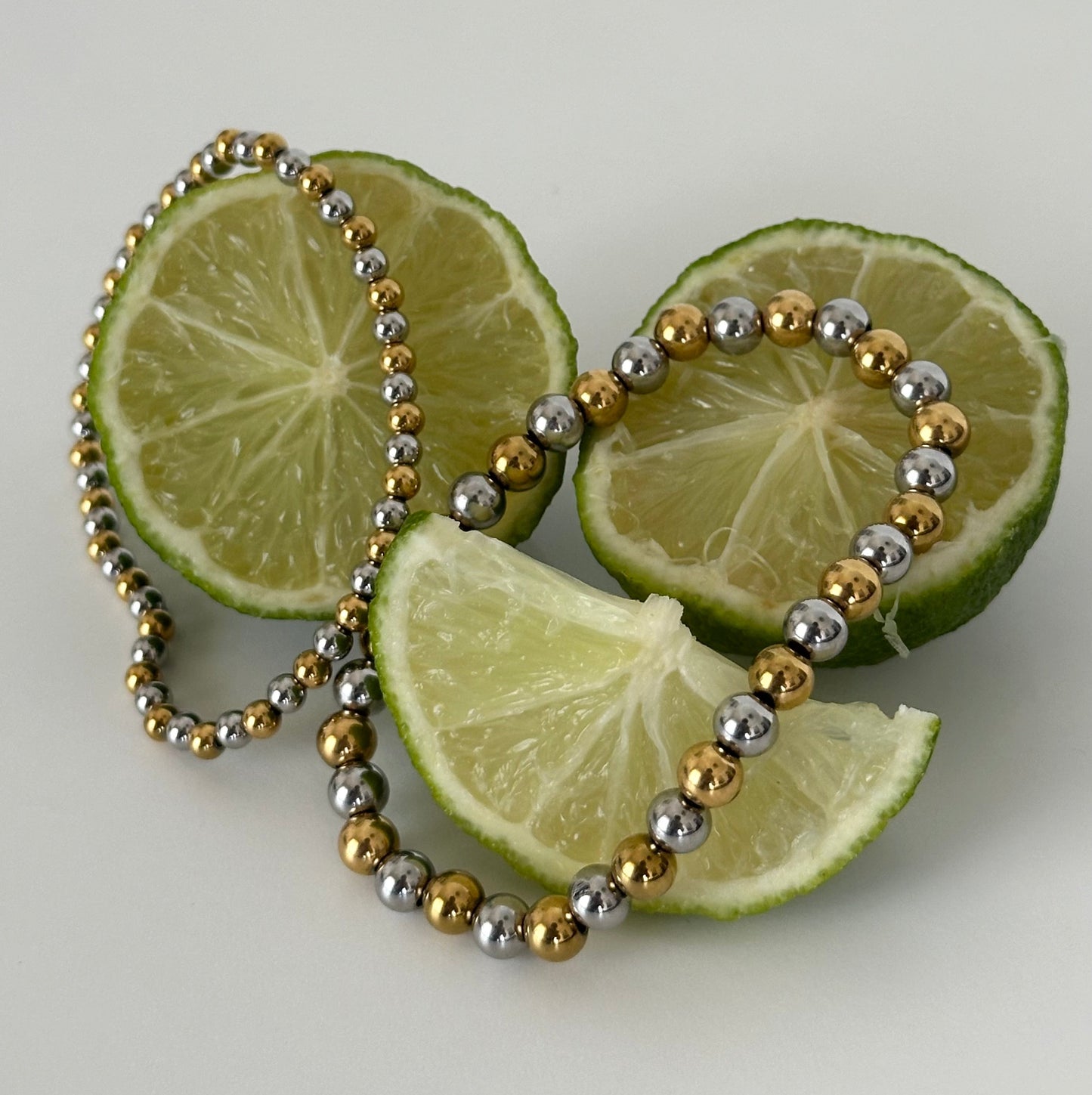 lot de 2 bracelets Abby élastiques acier inoxydable plaqué or 18k billes bicolores